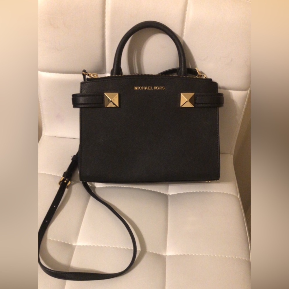 Michael Kors purse.  In great condition. Comes in it’s original bag.